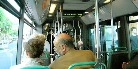 Passengers on the 95 bus in Paris passengers
