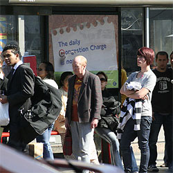 London bus stop Waiting at the bus stop. Photo by Fabbio.